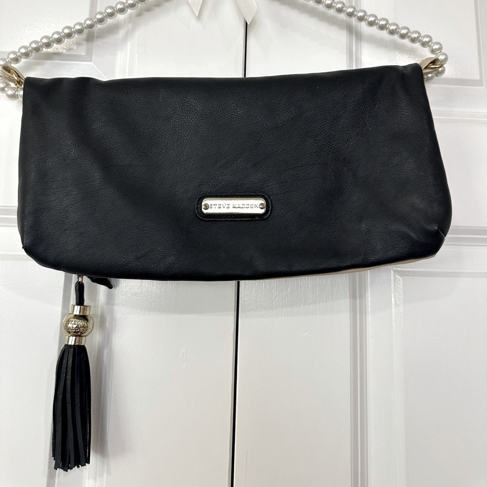 Steve Madden under arm faux leather black flap clutch with tan inner flap
